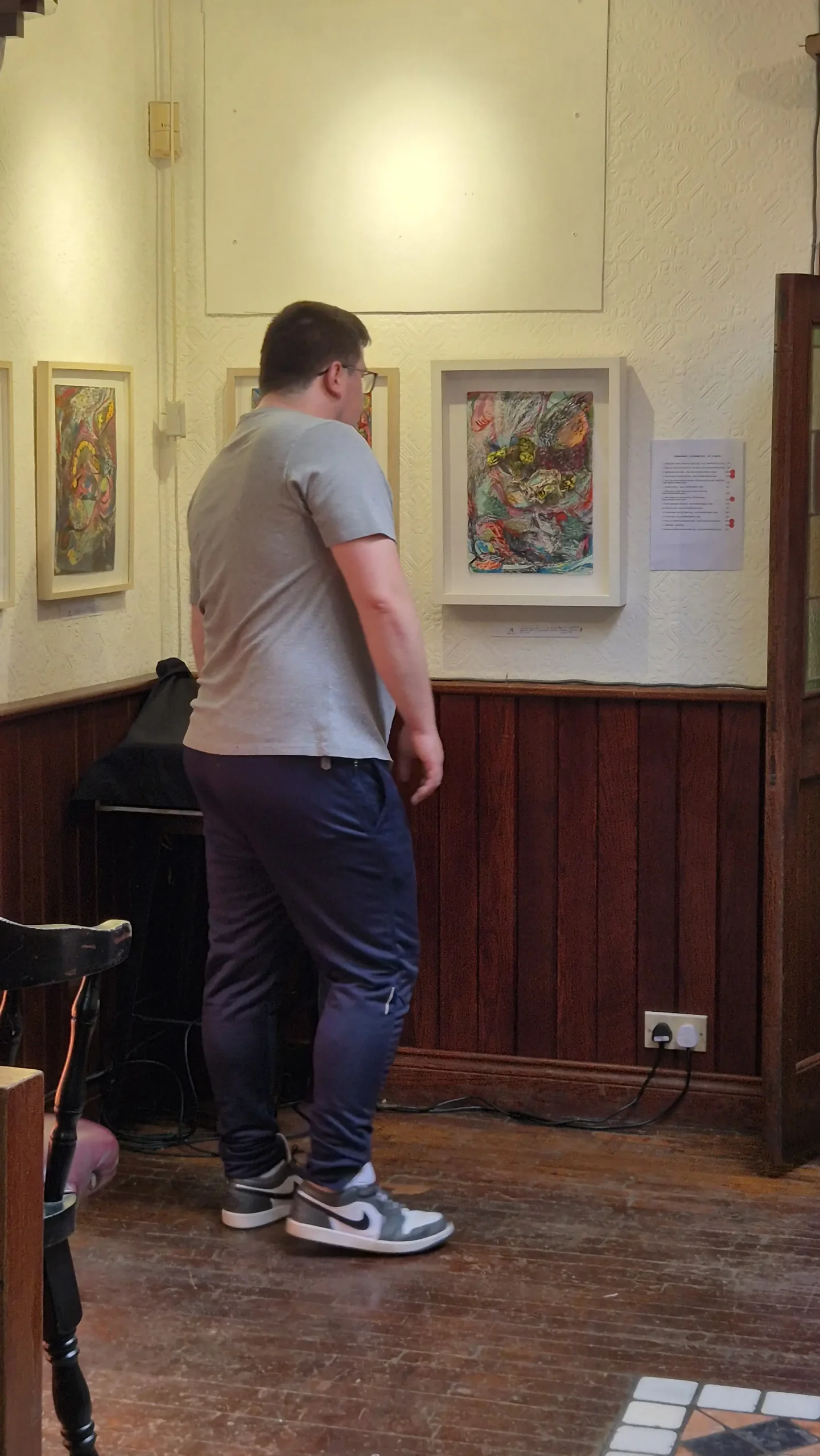 A man looks at art