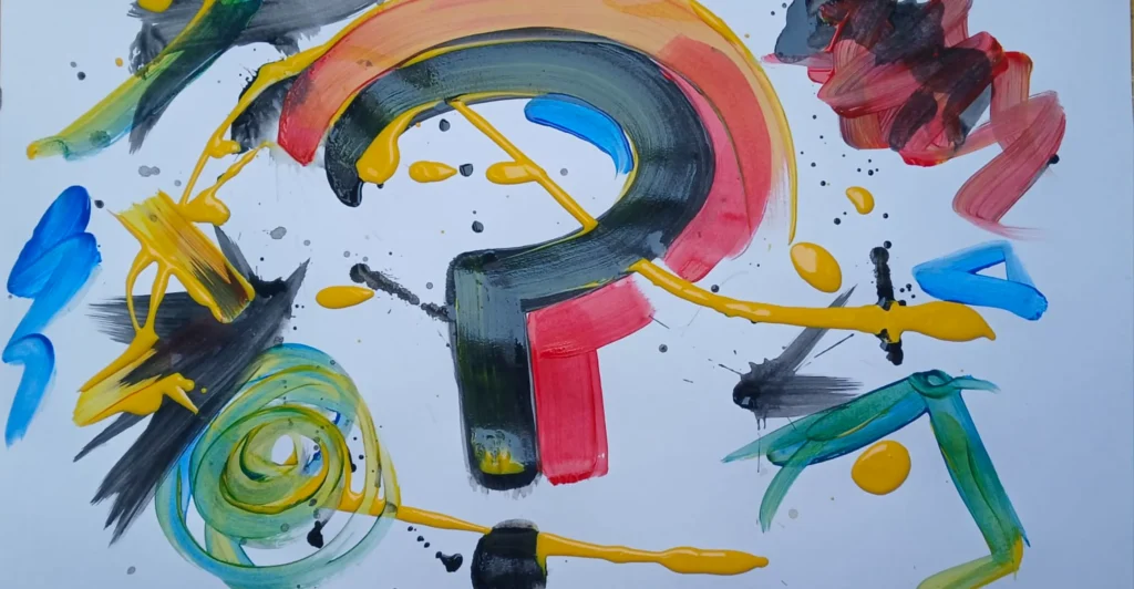 Colours paint splats and paint in the shape of a question mark