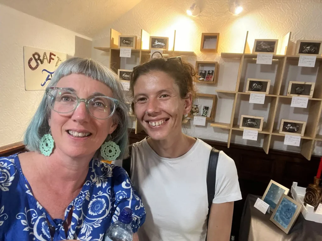 Two people in craft shop