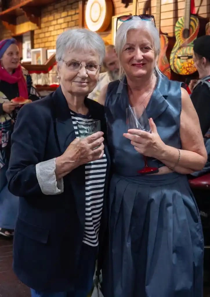 two women at launch party