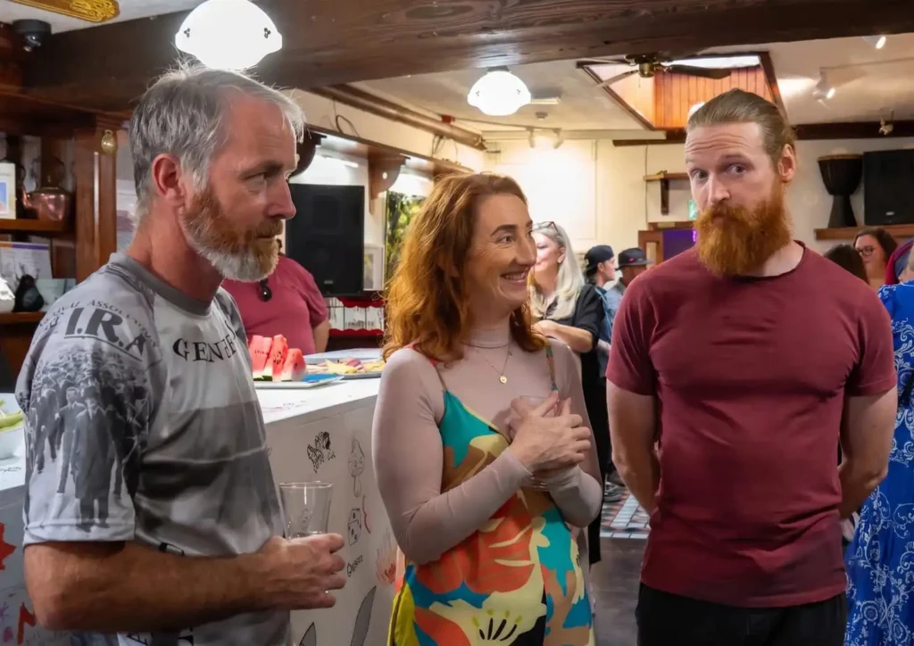 Three people at launch party